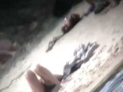 Nudist couples video clip by a hidden beach camera