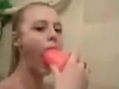 blonde teen masturbates in the bathtube