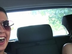 Lesbian girlfriends licking on the backseat