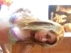Young blonde teen strips and toys with her cunt online