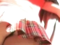 Candid street booty video of a hot chick in a sexy short plaid skirt