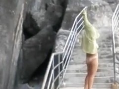 walking undressed on the stairways outside