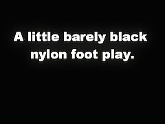 Black pantyhose tights foot play